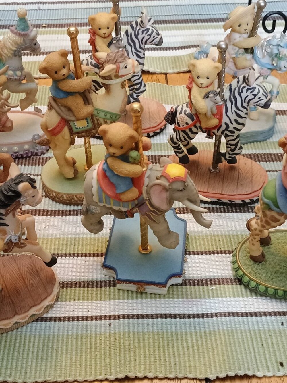 14 Cherished Teddies on Carousel Animals